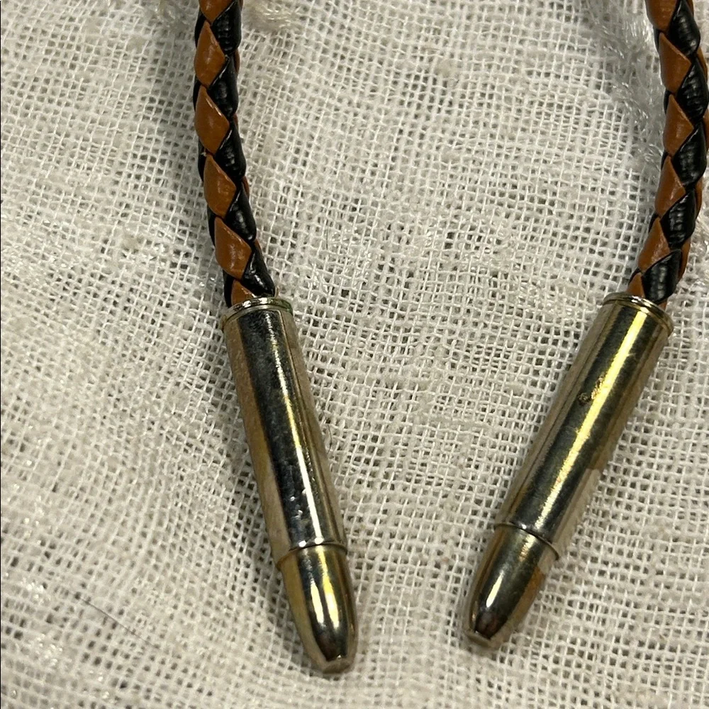 Vintage Bolo tie western leather and ornate medallion with bullet ends